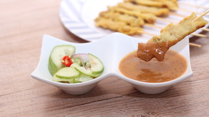Pork satay,Grilled pork served with peanut sauce or sweet and sour sauce, Thai Street food.