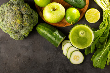 Healthy detox smoothie with cucumber, broccoli, green apple, kale and green grapes. Detox drink.