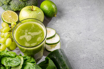 Healthy detox smoothie with cucumber, broccoli, green apple, kale and green grapes. Detox drink.