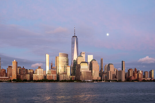 New York city lower Manhattan skyline at twilight with moon