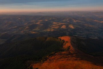 Fototapeta na wymiar Aerial view on Mountains at sunset