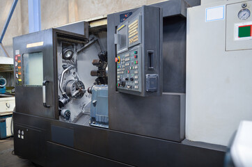 working on an industrial machine