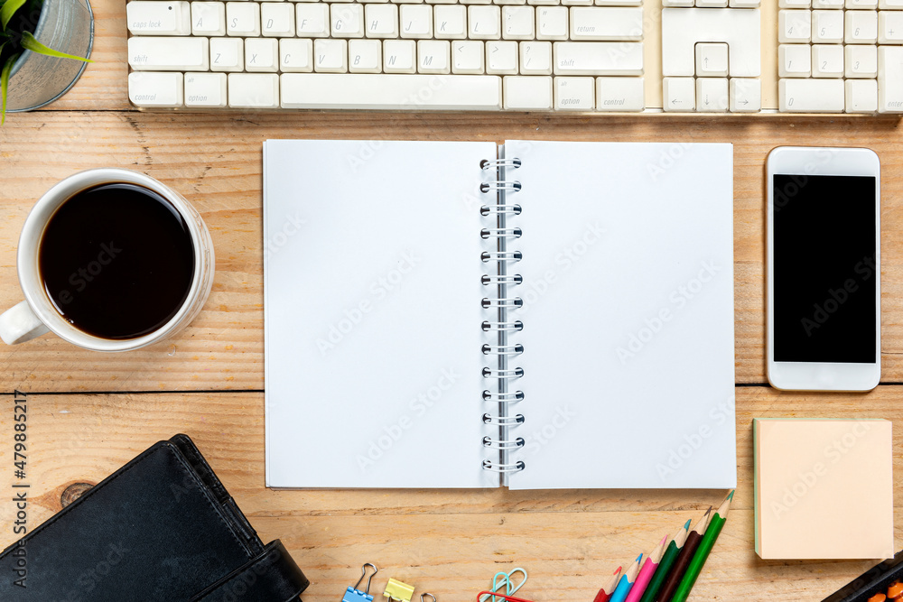 Poster computer keyboard with mobile phone and cup of coffee with note book