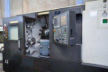 working on an industrial machine