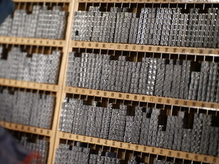 Metal Chinese characters in the printing case culture art of China. Chinese word for printing in the plate made for categorize the words. Chinese script and culture, art concept photo