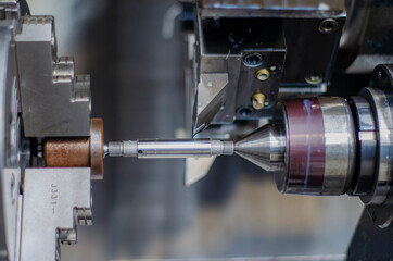 working on an industrial machine
