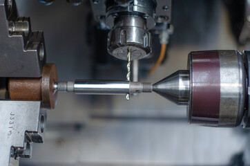 working on an industrial machine