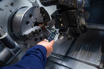 working on an industrial machine