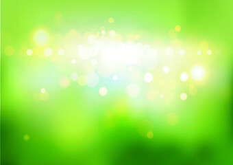Abstract background with bokeh effects in green colors