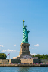 The statue of Liberty  with blue sky background.