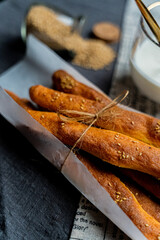 Sesame breadsticks on a table