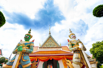Fototapeta premium Demon Guardian statues decorating the Buddhist temple Wat Arun in Bangkok, Thailand