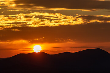 Sunset in the mountains and clouds