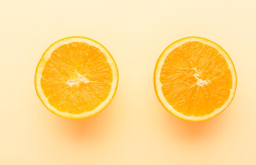 Fresh cut orange on color background