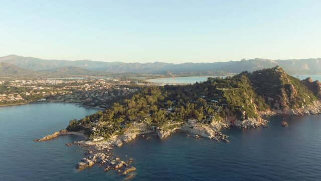 Aerial view of east Sardinia Italian island coastline with rock bound cliff formation wild nature vegetation in Mediterranean Sea