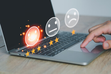 Business people or customers show satisfaction through the application on the laptop screen. By...