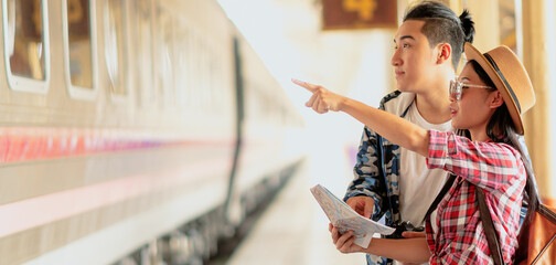 asian woman and man traveler backpack enjoying travel holiday.