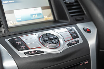Car control panel of audio player and other devices.A shallow depth of field close up of the...