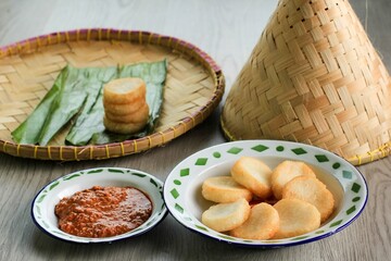 Ulen Ketan, Indonesian Traditional Snack Made from Steam Sticky Rice, Compressed or Shaped and then Deep Fried, Served with Sambal Oncom