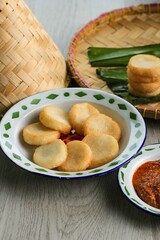 Ulen Ketan, Indonesian Traditional Snack Made from Steam Sticky Rice, Compressed or Shaped and then Deep Fried, Served with Sambal Oncom