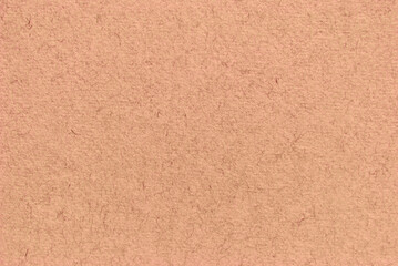 A sheet of brown craft paper or cardboard texture as background
