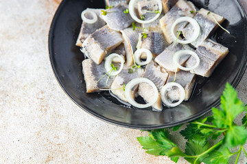 herring salted piece plate seafood fish meal food snack on the table copy space food background