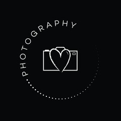 White photography stamp logo on a black coloured background. Wedding photographer logo. With love camera icon. Romantic logo design. Hand drawn stamp icon.