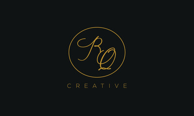 Fototapeta premium BQ is a stylish logo with a attractive and creative design and golden color with blackish background.