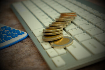 Business finance and money concept, hand stacking coins Set aside funds to prepare for the future.