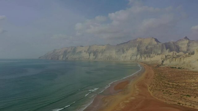 Aerial View Of Beach Coastline Next To Arabian Sea At Hingol National Park In Balochistan. Dolly Forward, Establishing Shot