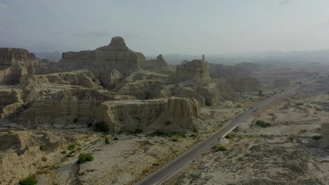 Aerial View Of Empty Highway Road Through Arid Mountain Landscape Hingol National Park In Balochistan