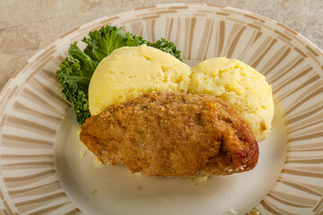 Crispy chicken cutlet with mashed potato