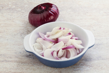 Sliced red onion in the bowl