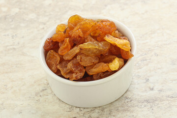 Sweet yellow raisin in the bowl