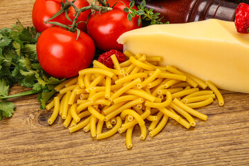 Italian pasta raw Maccheroni for cooking