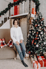 Portrait of a pretty woman at home for Christmas