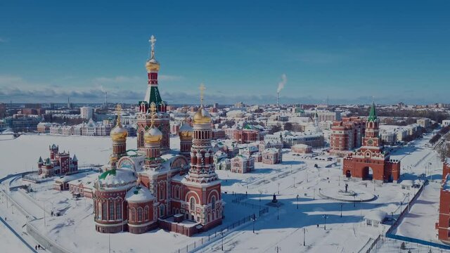 4K Aerial Footage View to the Blessed Virgin Mary Church on the Republic Square from the Bruges Embankment, Mari El Republic, Russia