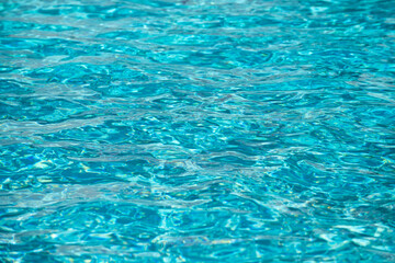 Fototapeta na wymiar Pool water background, blue wave abstract or rippled water texture background.