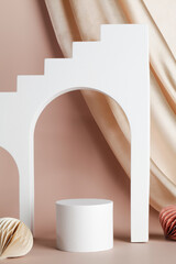 podium for product display on beige background with textile and honeycomb paper decor. product background for Christmas and winter holiday concept. 