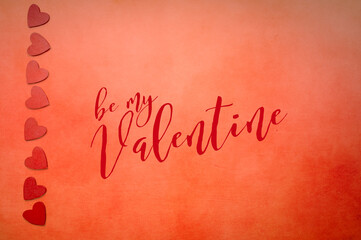 Be my valentine background with red hearts on red background