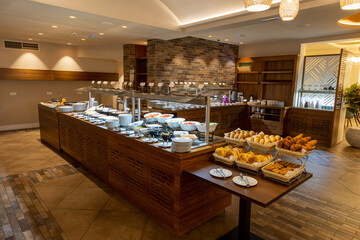 Appetizers and salad served on a buffet table in the restaurant