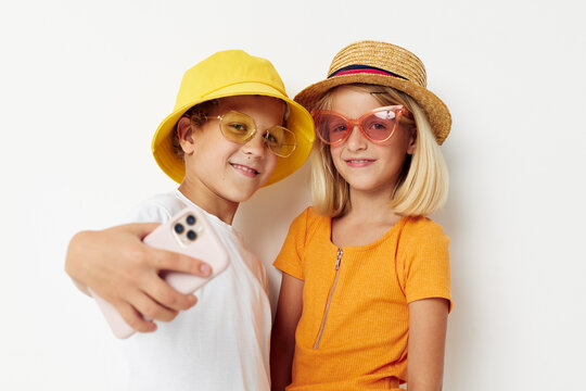 funny kids wearing hats fashion phone selfie communication