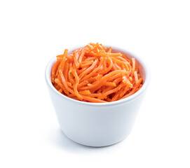 Delicious spicy carrot salad in ceramic bowl isolated on white
