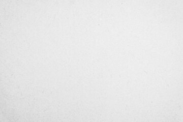 White recycled craft paper texture as background. Grey paper texture, Old vintage page or grunge vignette of old cardboard. 