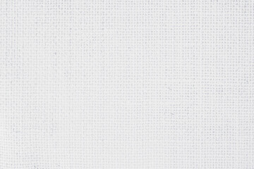 White fabric jute hessian sackcloth canvas woven gauze texture pattern in light white color blank.