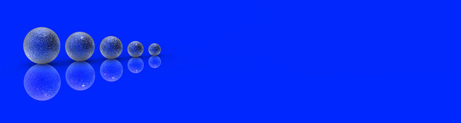 Five balls of metal of different sizes of blue color on blue background. Growth of something. Progress. Reflection. Banner for insertion into site. Horizontal image. 3D image. 3D rendering.