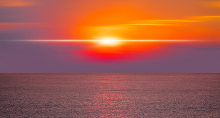 Obraz premium Panorama of orange sunset over Mediterranean sea with turquoise sea wave - Alanya, Turkey