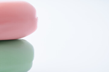 Stack of soap bars on white background