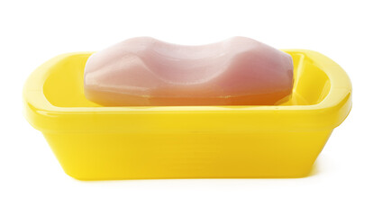 Soap on a plastic soap dish isolated on a white background