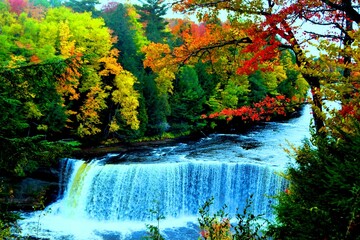 The Tahquamenon Falls are two different waterfalls on the Tahquamenon River. Both are located near Lake Superior in the eastern Upper Peninsula of Michigan. 
